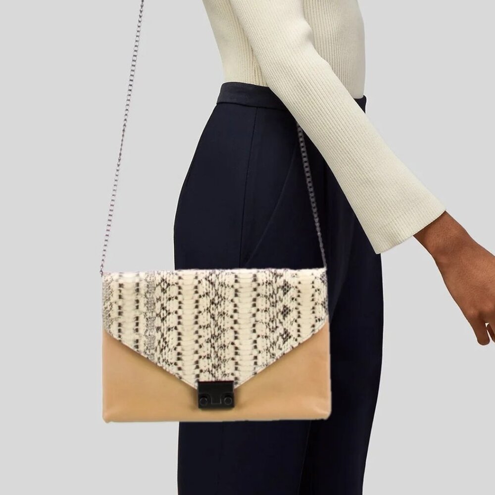 Loeffler Leather Randall Python Lock Clutch Cross… - image 1